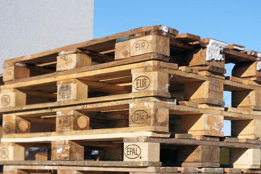 Used EPAL Euro pallets stacked outdoors