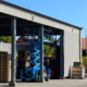 Blue scissor lift at GLF’s pallet warehouse in Genarp during installation of the new bird-proofing.