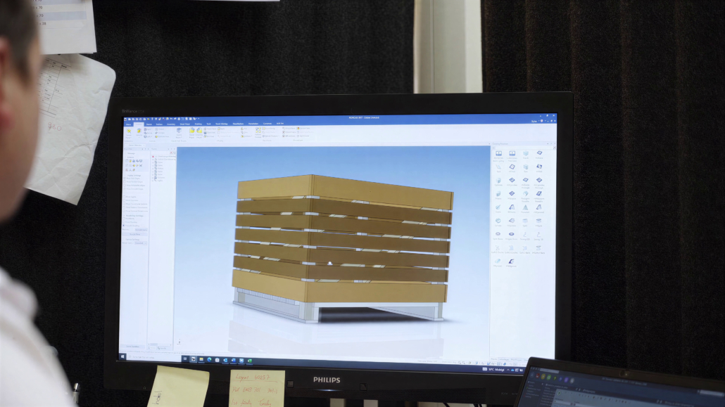 A designer develops a custom pallet in CAD at GLF.