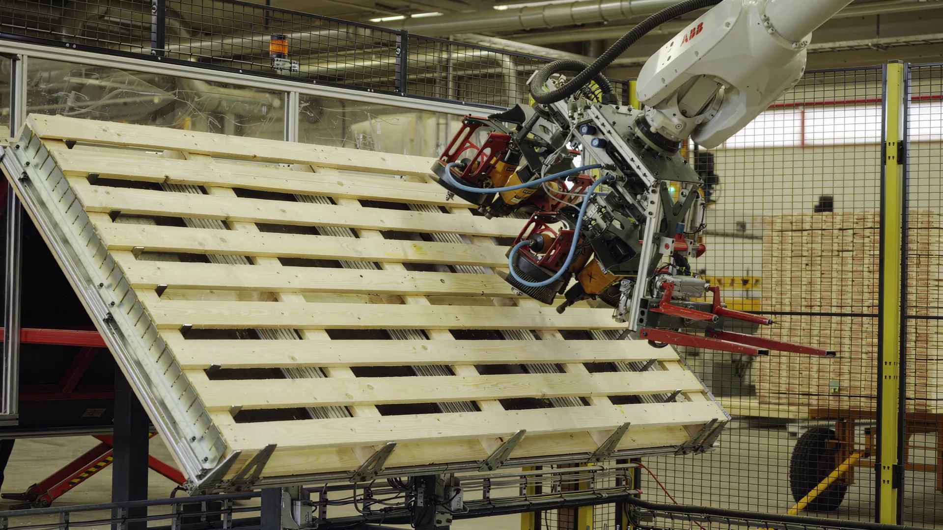 Wooden pallet in a robotic cell in Genarp.