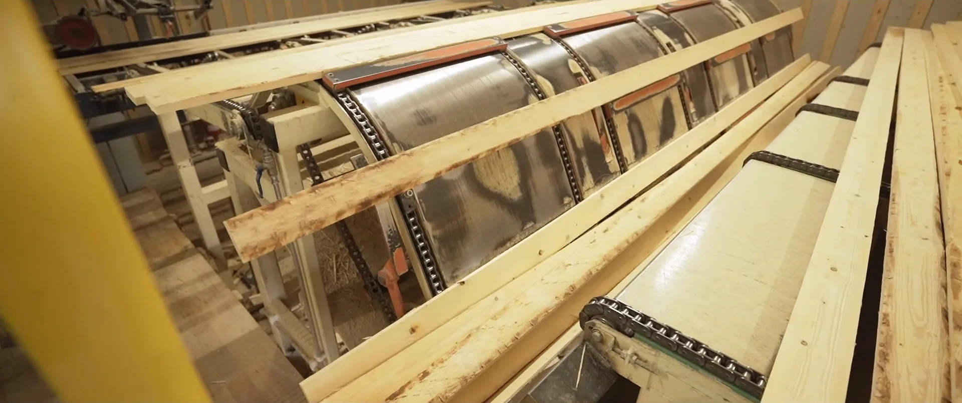 Timber moving through production equipment